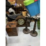 Oak framed mantel clock; small three drawer cabinet; and pair of turned wood candlesticks