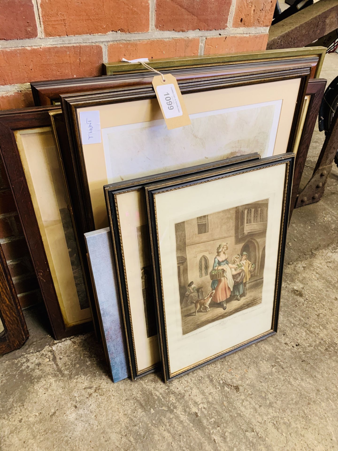 Collection of eleven framed and glazed prints.