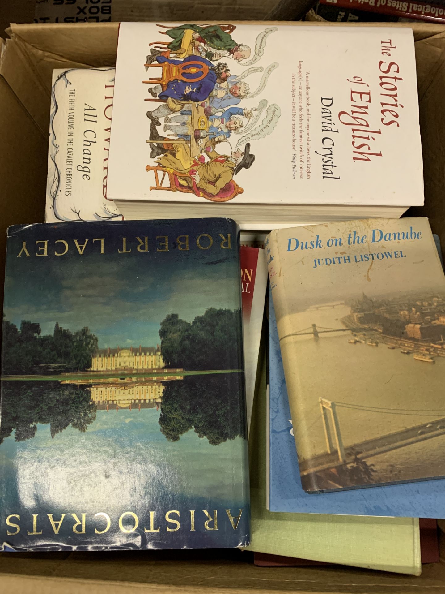 Two boxes containing a large quantity of books on history.
