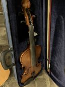 Violin (fitness) case and bow.