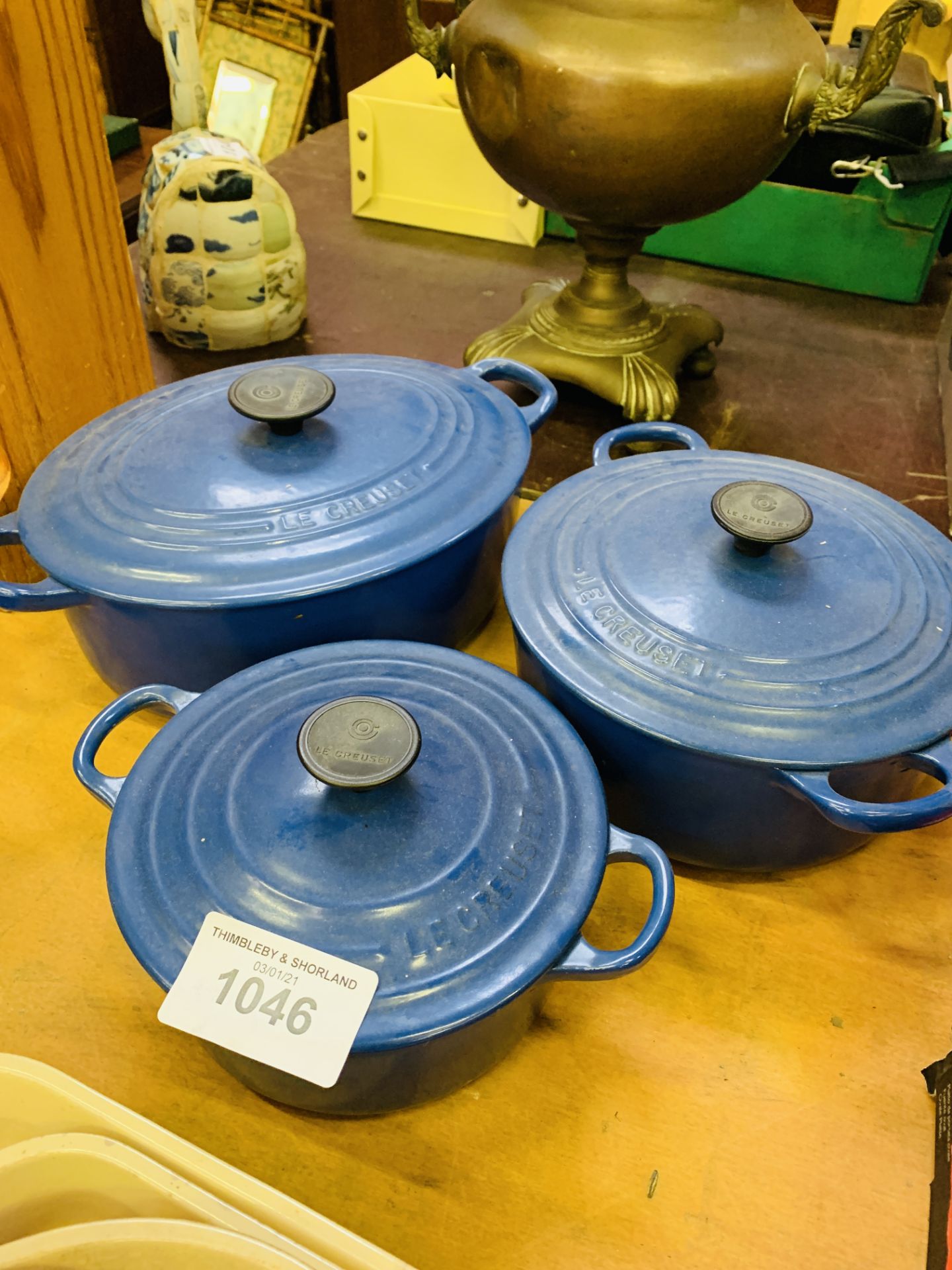 Three blue Le Creuset casserole dishes. - Image 2 of 3
