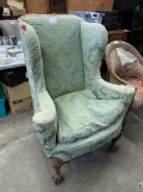 Victorian zebra wood wing back armchair in red upholstery.