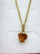 9ct gold citrine pendant on 9ct gold chain.