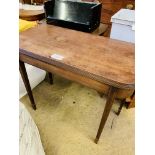 Mahogany gate leg side table with fold over top on tapered legs.
