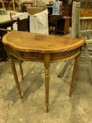 Walnut veneer serpentine fronted demi-lune table.