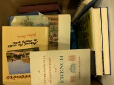 Three boxes containing a large quantity of books about Hungary.