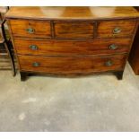 Mahogany bow fronted two over three chest of drawers.