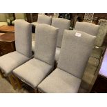 Set of six grey upholstered high back chairs.