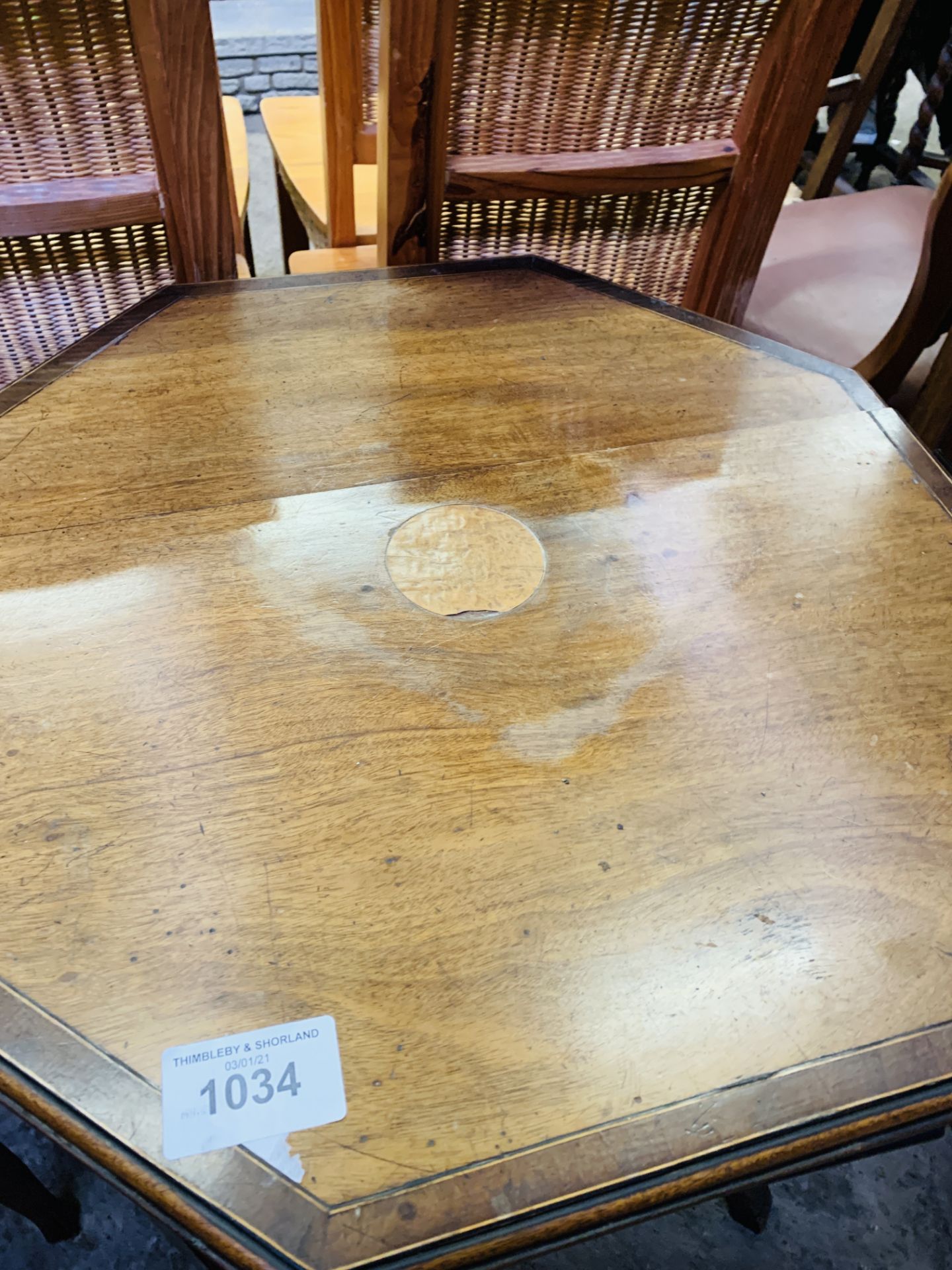 Mahogany octagonal top display table, together with a mahogany sewing box.