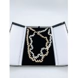 Class 2 row freshwater pearl necklace, boxed