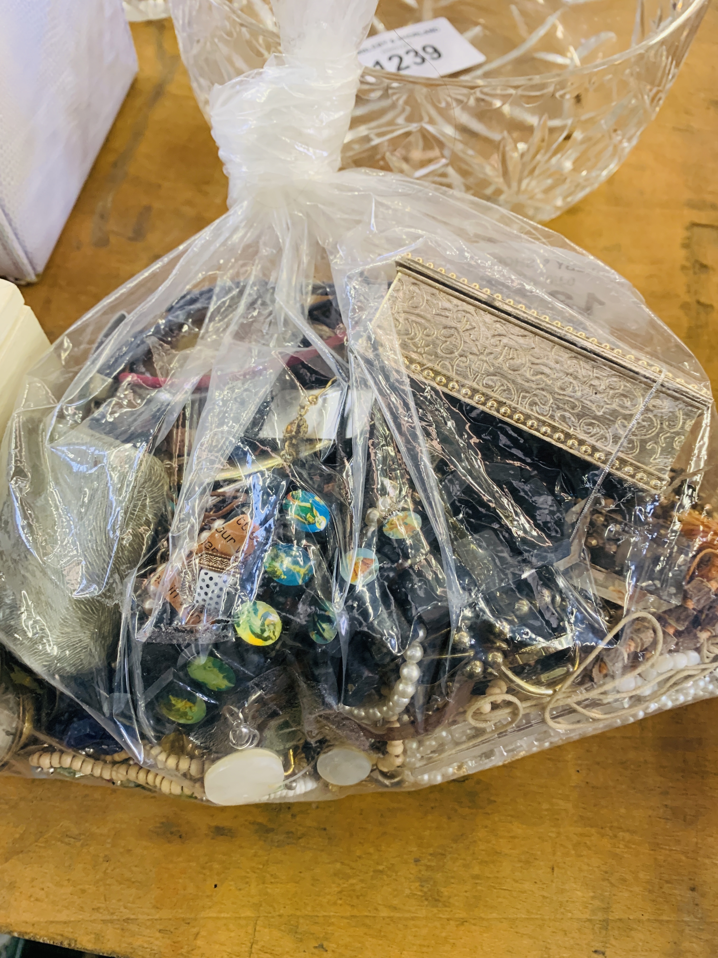 Bag containing a large quantity of costume jewellery. Estimate £20-40. - Image 2 of 2