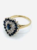 9ct gold heart shaped sapphire and diamond ring.