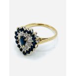 9ct gold heart shaped sapphire and diamond ring.