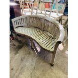 Teak serpentine fronted curved garden bench