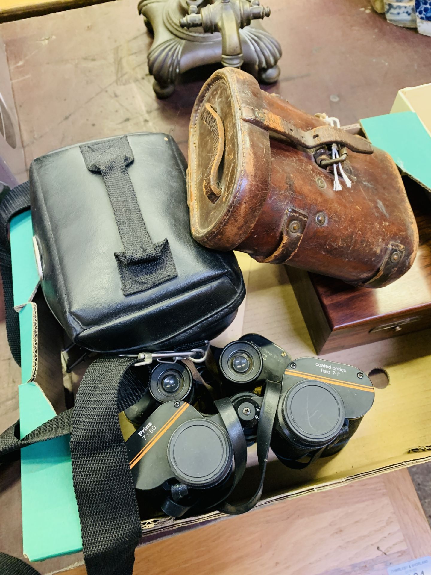 Pair of WW1 binoculars; a pair of WW2 binoculars; and other items.