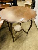 Mahogany display table together with a hardwood coffee table.