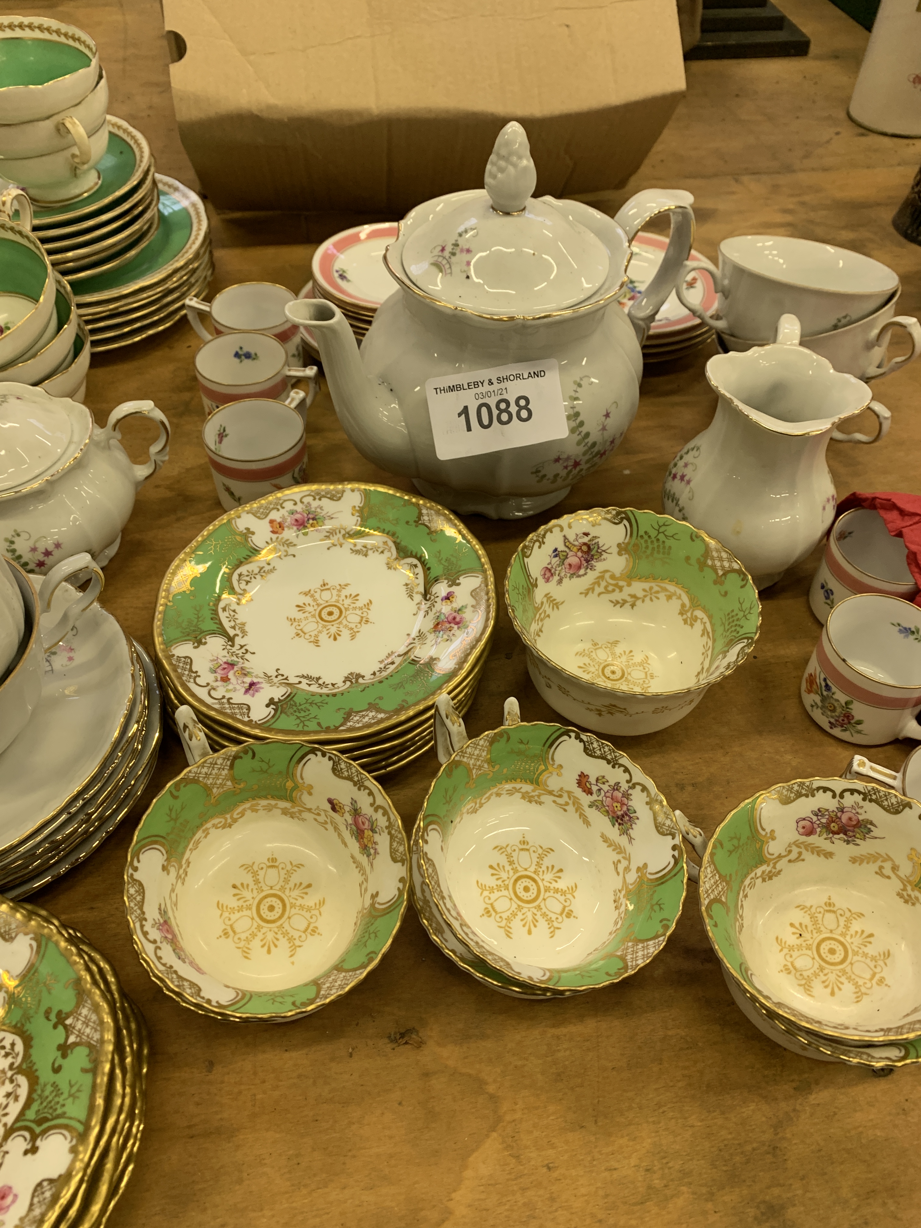Assortment of china and part tea services.