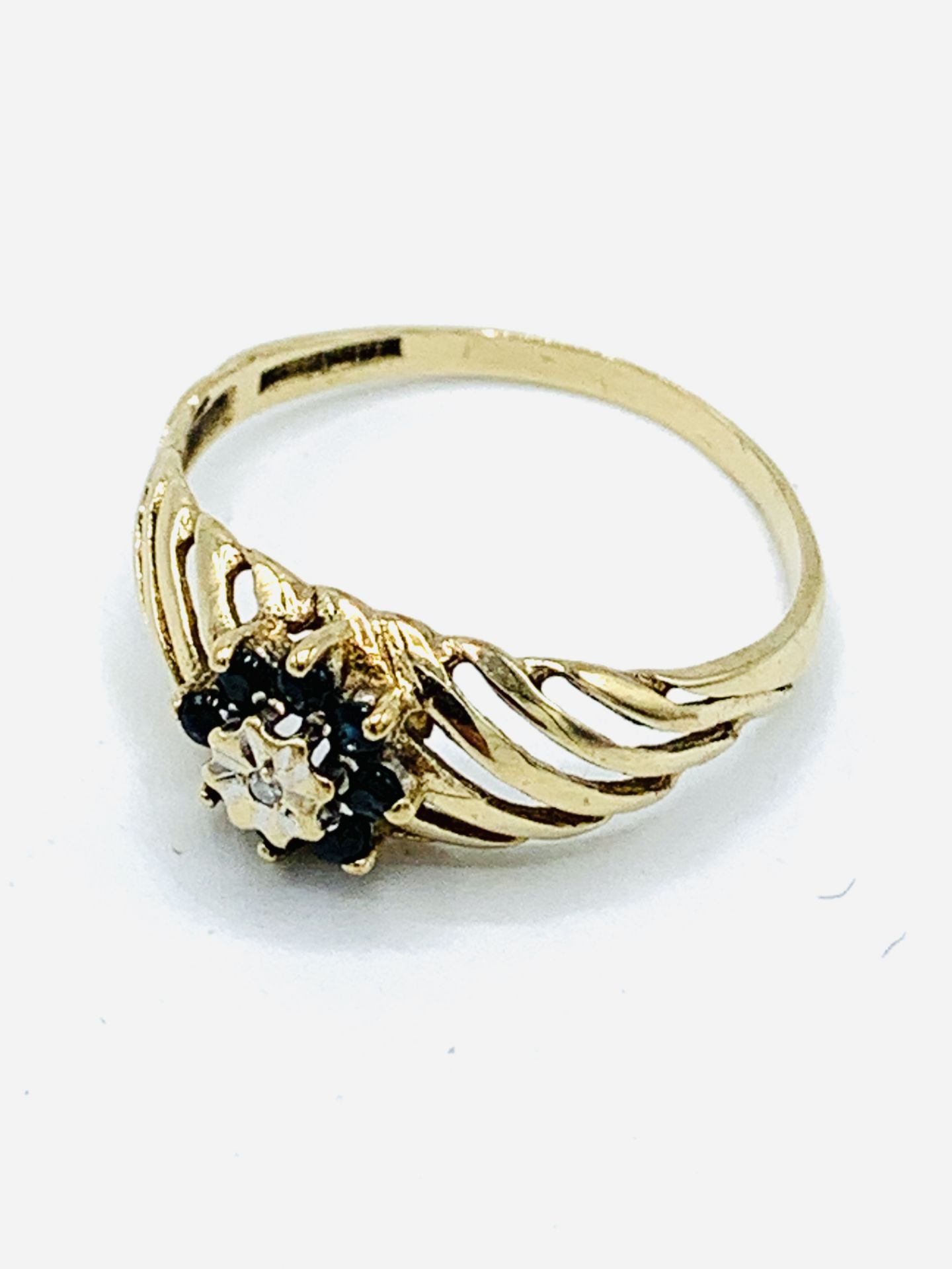9ct gold sapphire and diamond filigree ring.
