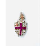 Hallmarked silver synthetic ruby and paste armorial brooch.