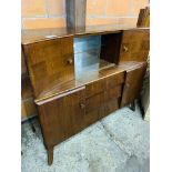 1950's sideboard with glass sliding doors.