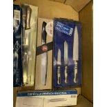 Box of seven new kitchen knives.