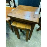 Nest of two hardwood tables; circular display table; mahogany wine table; mahogany bedside table.