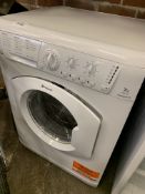 Hotpoint Aquarius WDL754 wash and dry machine, working