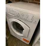 Hotpoint Aquarius WDL754 wash and dry machine, working