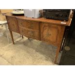 Bow fronted mahogany sideboard.