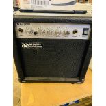 20 watt guitar practice amplifier boxed with user guide.