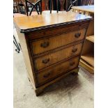 Hardwood small chest of three drawers, and a cane seat bedroom chair.