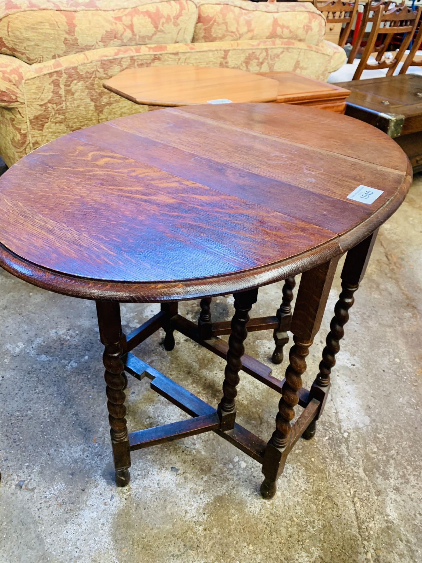 Two oak drop-side tables.
