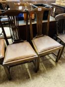 Two mid 19th century drop-in seat mahogany dining chairs with rail splat.