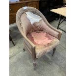 Mahogany framed Edwardian armchair on casters.