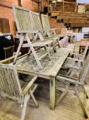 Teak garden table together with 6 teak reclining carver chairs