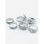 Six various silver rings.