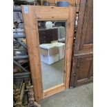 Pine framed wall mirror.