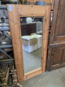 Pine framed wall mirror.