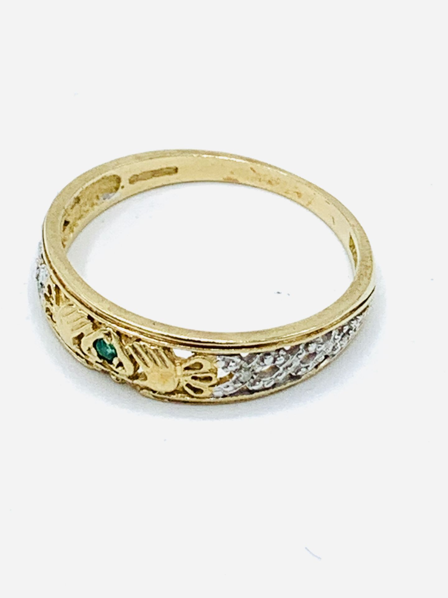 9ct gold emerald and diamond band.