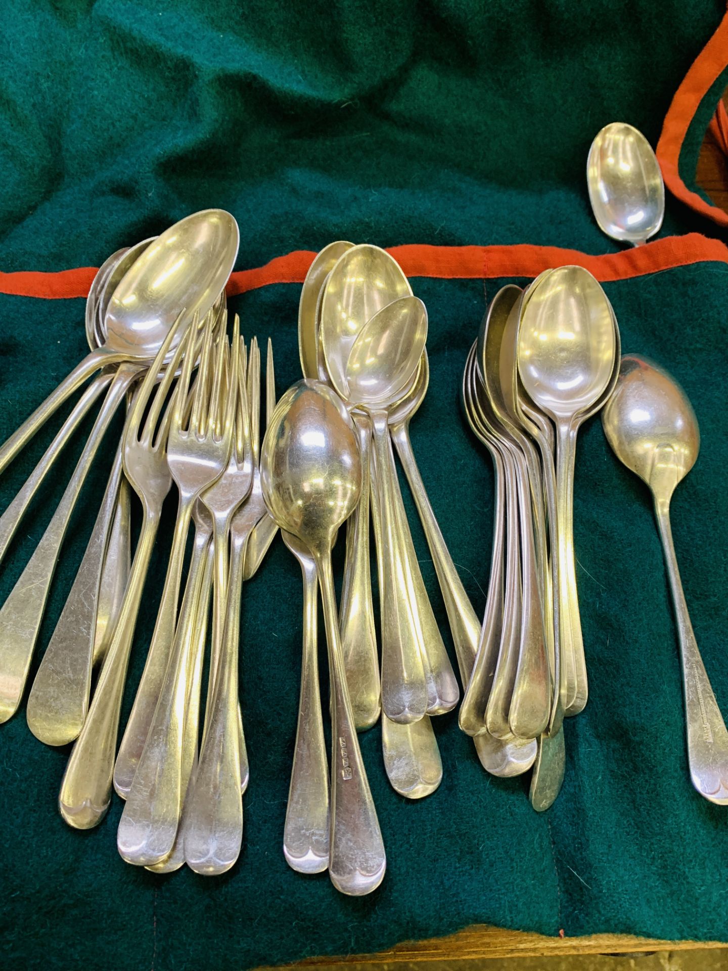 Quantity of silver plate cutlery and bone handled knives.