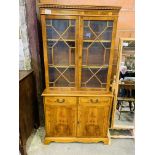 Yew wood veneer bookcase.