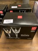 6 Melodia Crystal goblets. This item carries VAT.