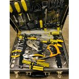 Tool box in the form of a brief case, complete with tools.