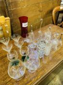Quantity of drinking glasses and glass bells.