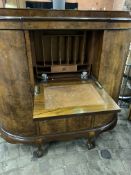 1930s walnut bow fronted bureau.