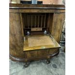 1930s walnut bow fronted bureau.