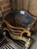 Ornate brass mounted cast iron fire basket.