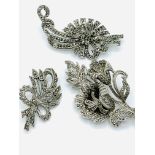 Three marcasite brooches.