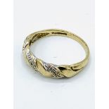9ct gold and diamond twisted ring.