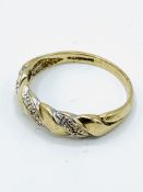 9ct gold and diamond twisted ring.